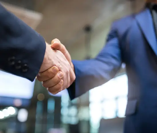 Recruiters discussing a hiring requirement with a client